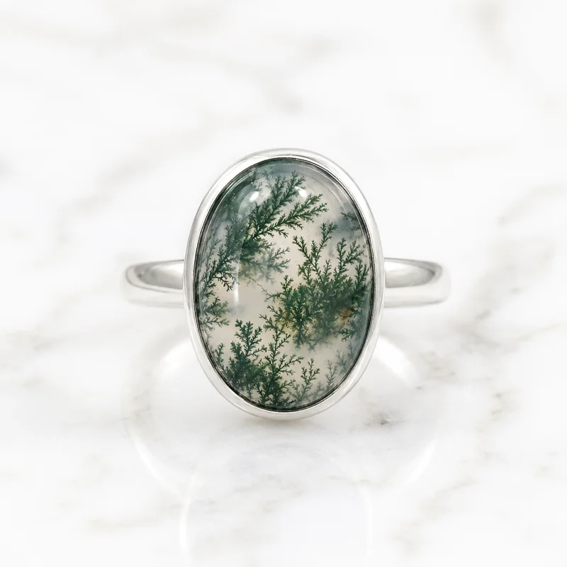 Moss agate ring with green fern-like patterns